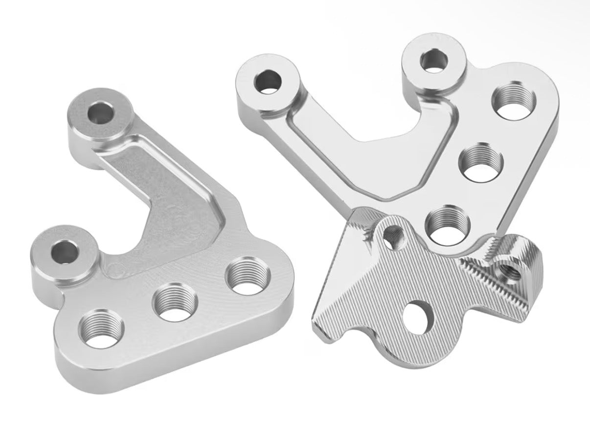Amp Supply upgraded silver peg brackets for Surron/Eridepro